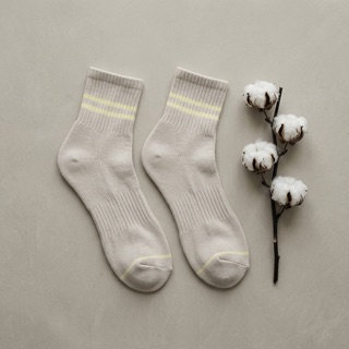 STROMA — pair beside a raw cotton boll branch